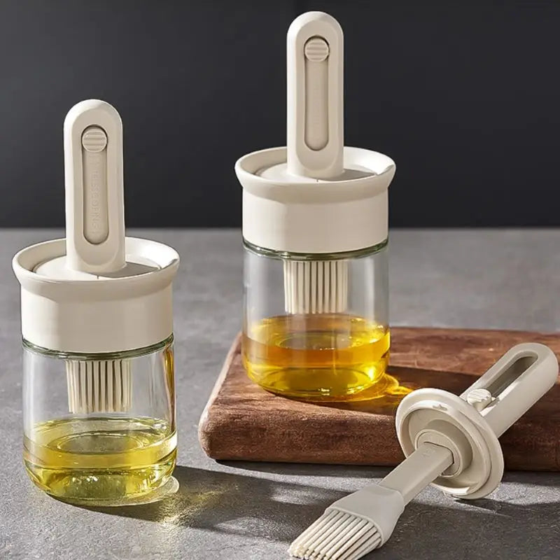 2-in-1 silicone oil brush bottle with dispenser and brush, showcasing sleek, ergonomic design for easy use.
