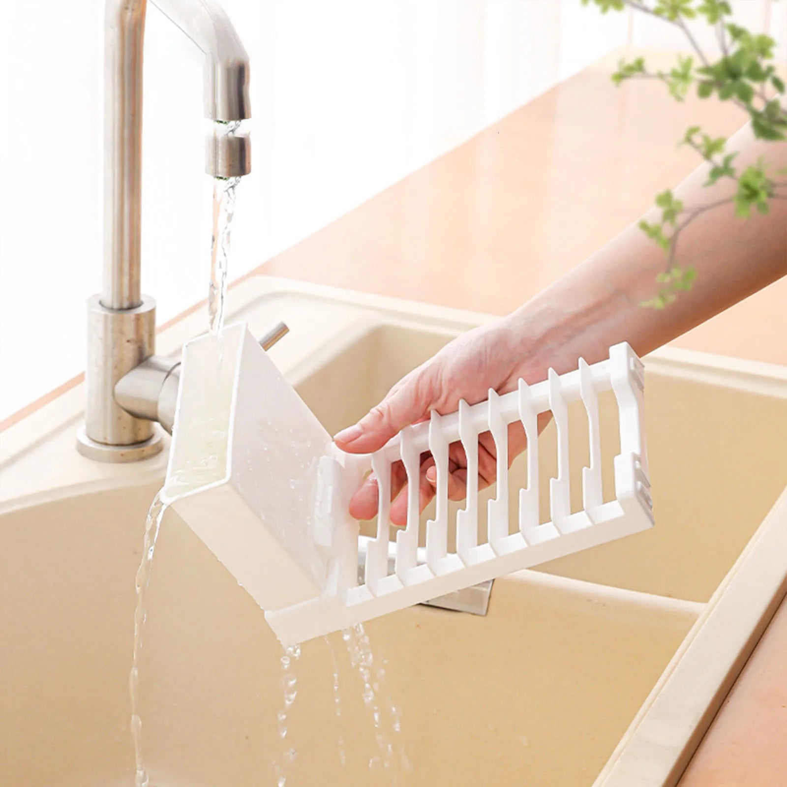 The foldable dish drying rack with a built-in drainage system that allows water to flow freely, drying dishes quickly and efficiently.