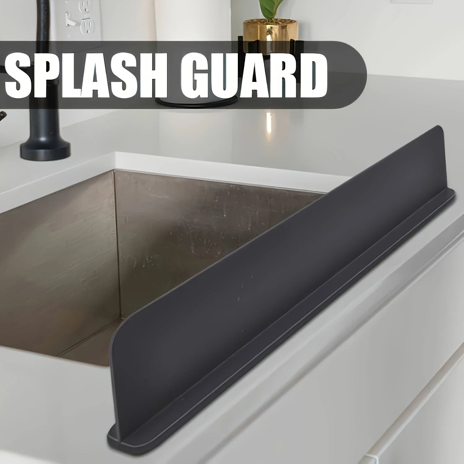 Flexible silicone water barrier adapting to sink edge for full coverage.
