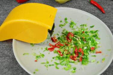 Full view of the Rolling Vegetable Cutter, ergonomic handle and rolling blade design.
