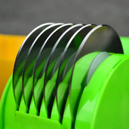 Rolling Vegetable Cutter slicing vegetables in use, showing smooth rolling action