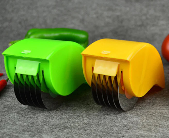 Close-up of the sharp stainless steel blade for smooth and precise vegetable slicing.
